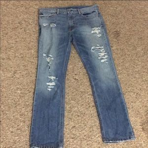 Blue distressed Levi 511 jeans